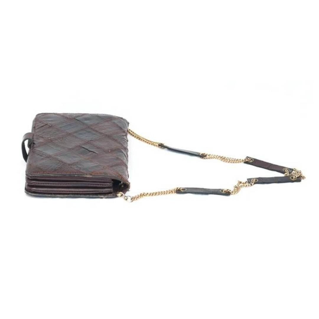 Clutch marrón cocodrilo
