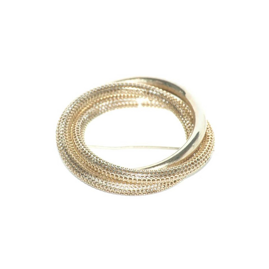 Broche dorado circular